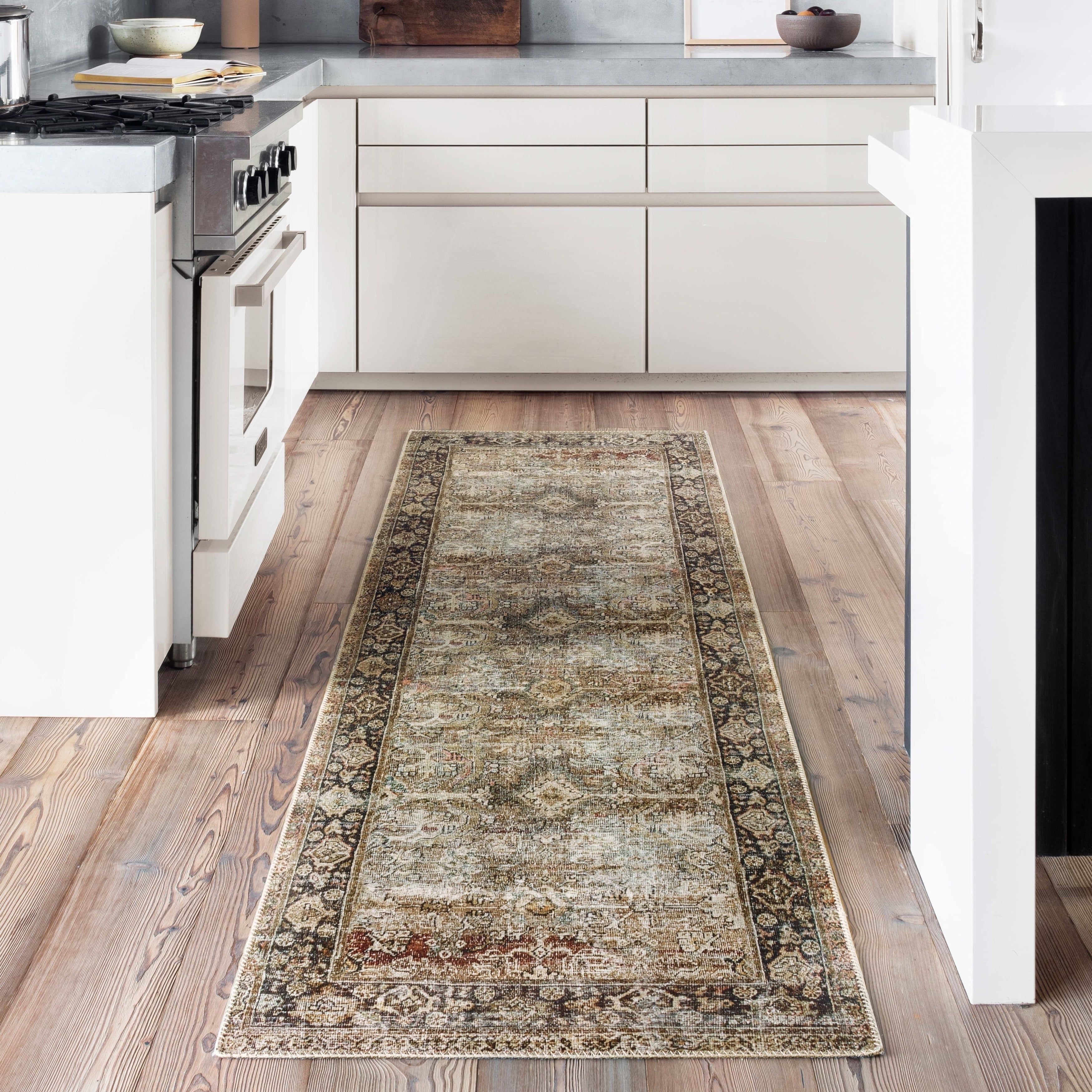 Tapis imprimé oriental ton olive Isabelle d'Alexander Home
