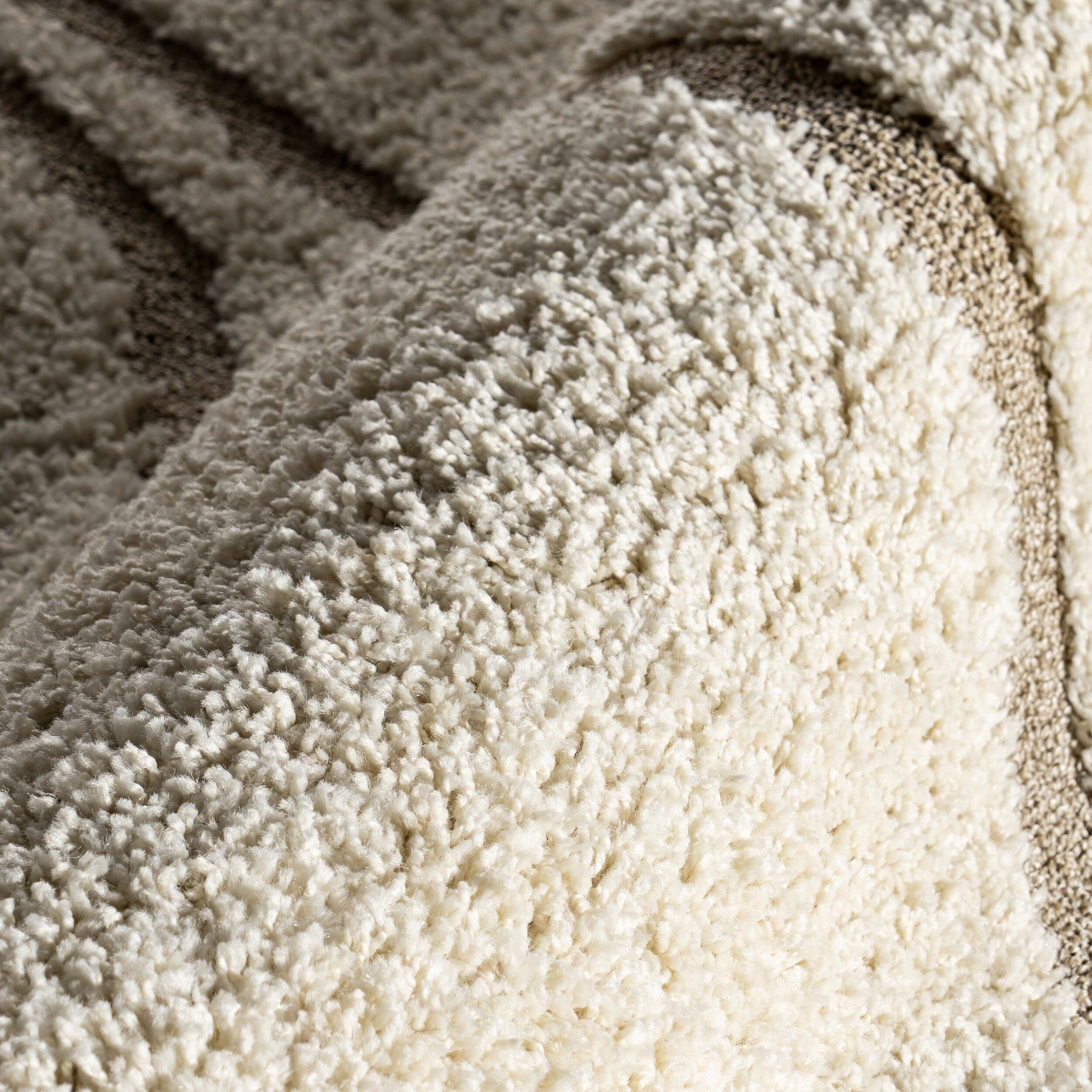 Tapis Shag contemporain Nuloom Krista à motifs tourbillonnants