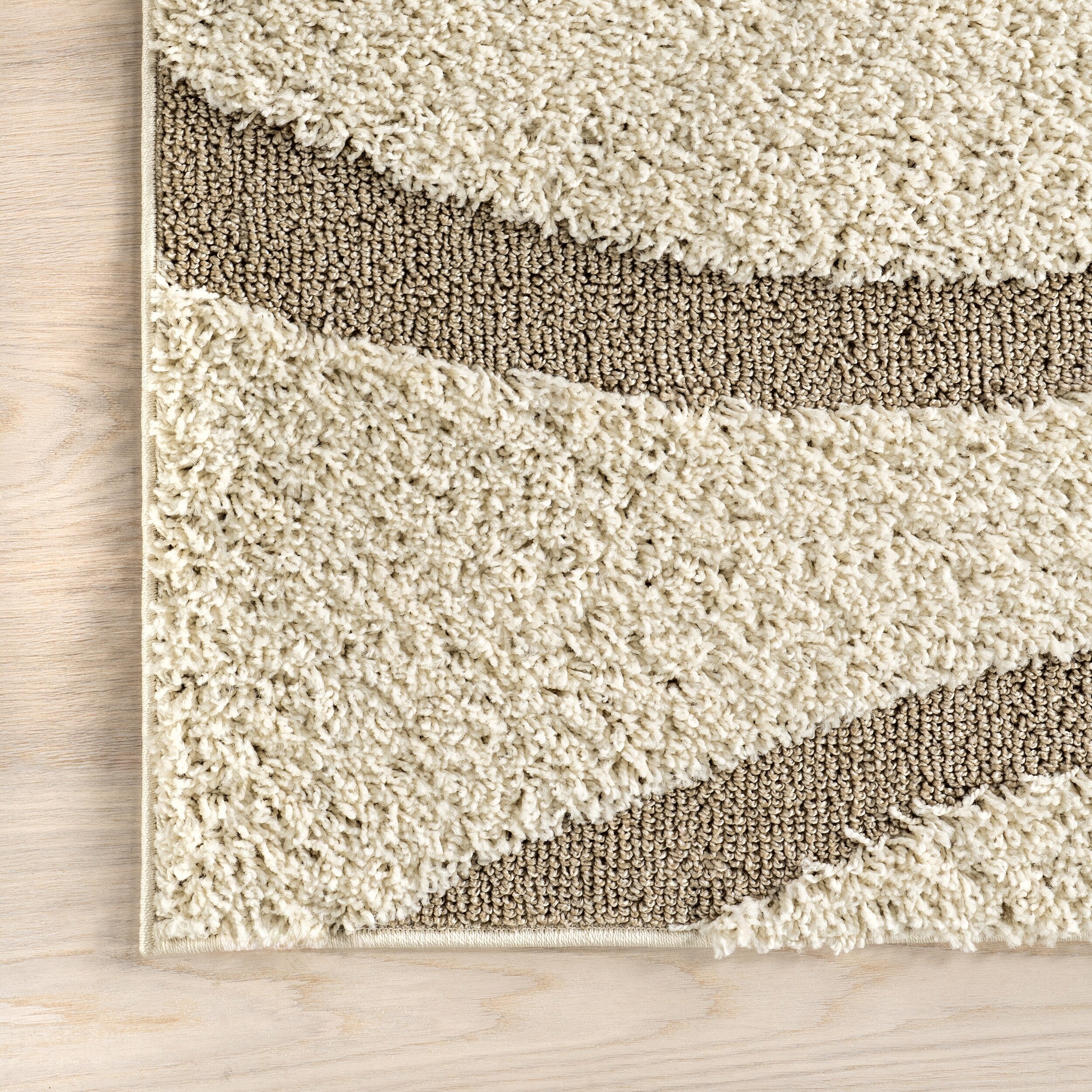 Tapis Shag contemporain Nuloom Krista à motifs tourbillonnants