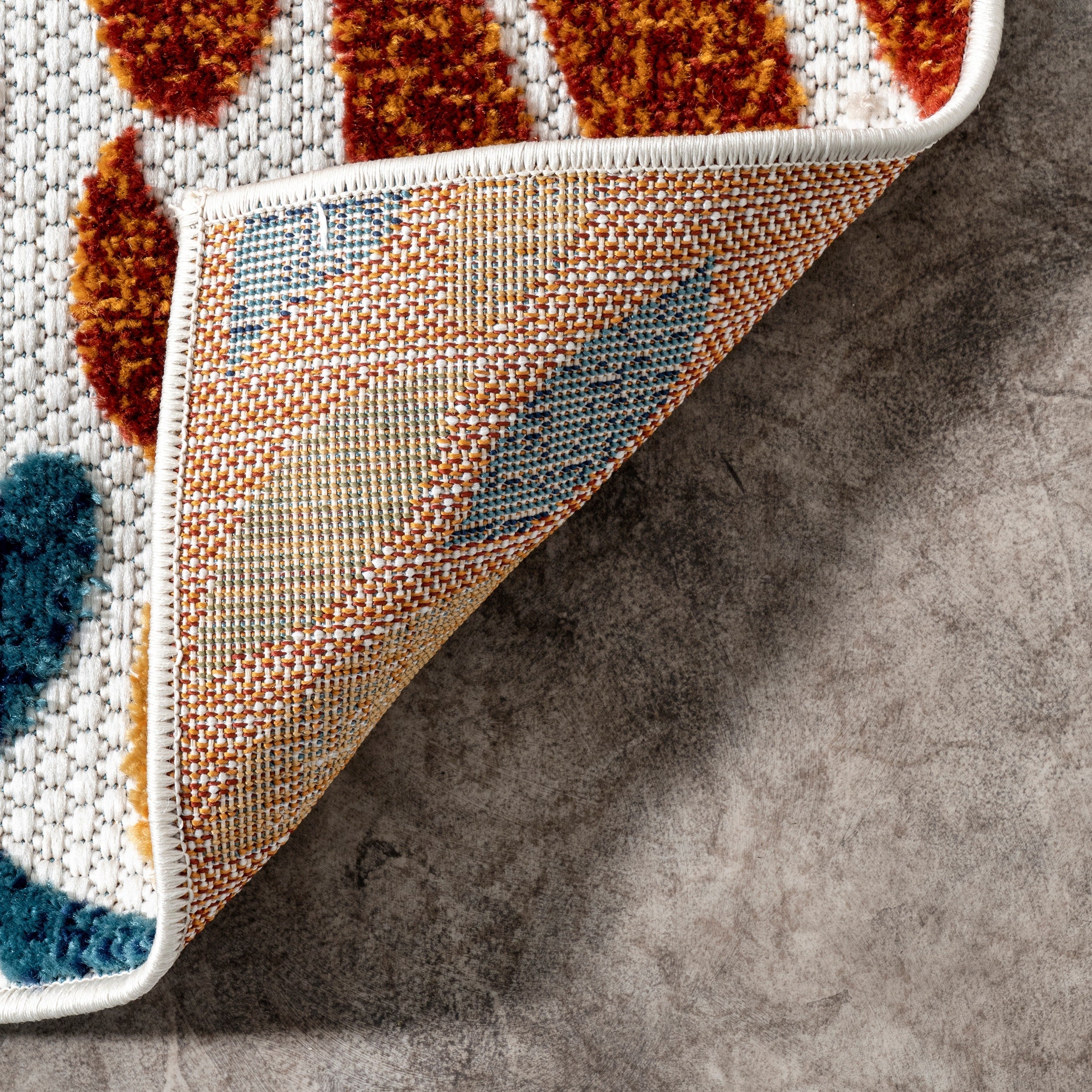 Tapis d'intérieur/extérieur à motif floral audacieux Nuloom Ronda