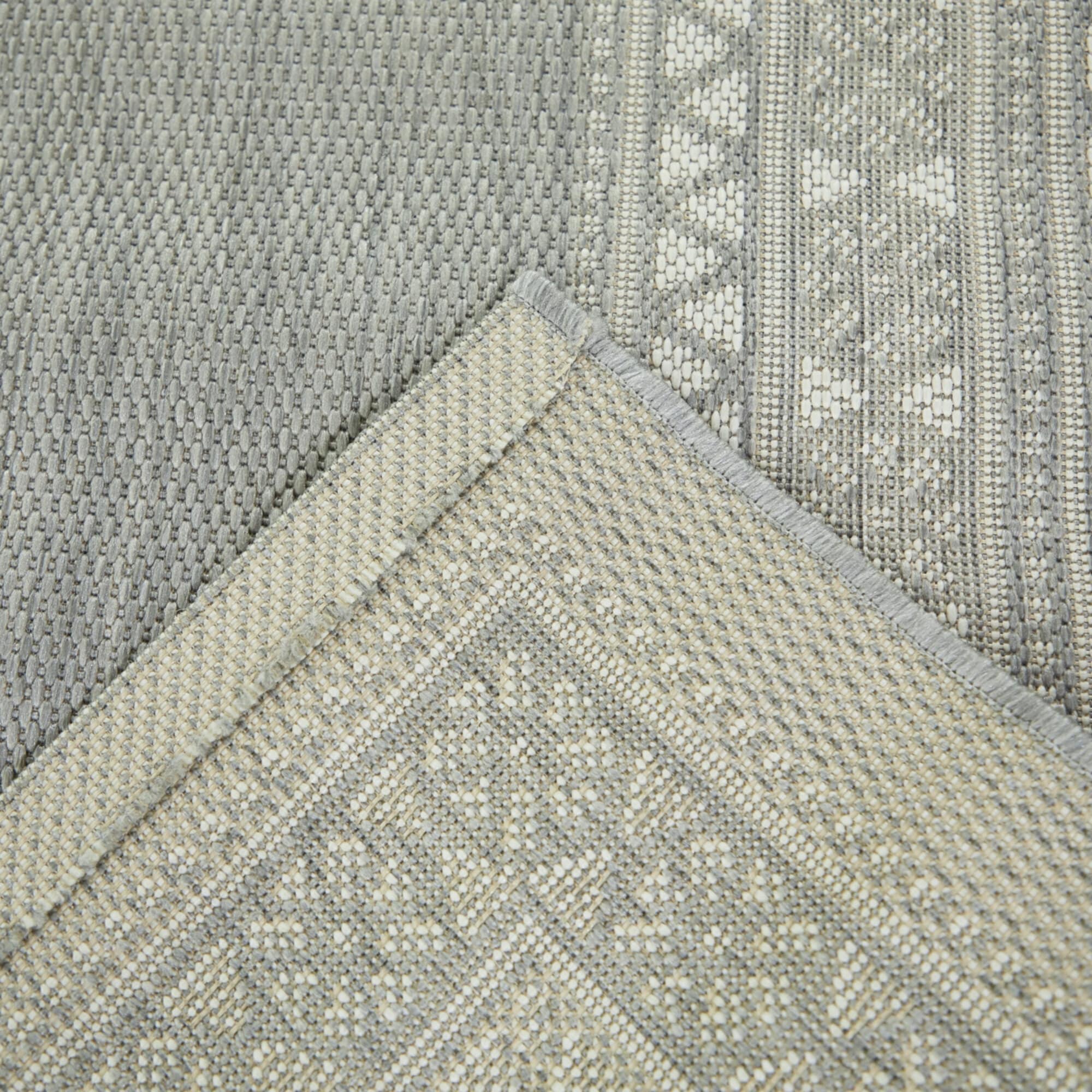 Tapis d'intérieur/extérieur à bordure transitionnelle Carew