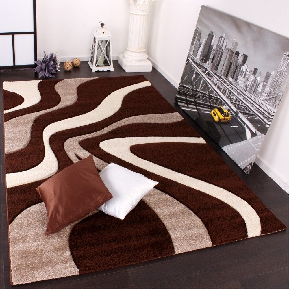 Tapis design avec contour découpé et motif ondulé moderne