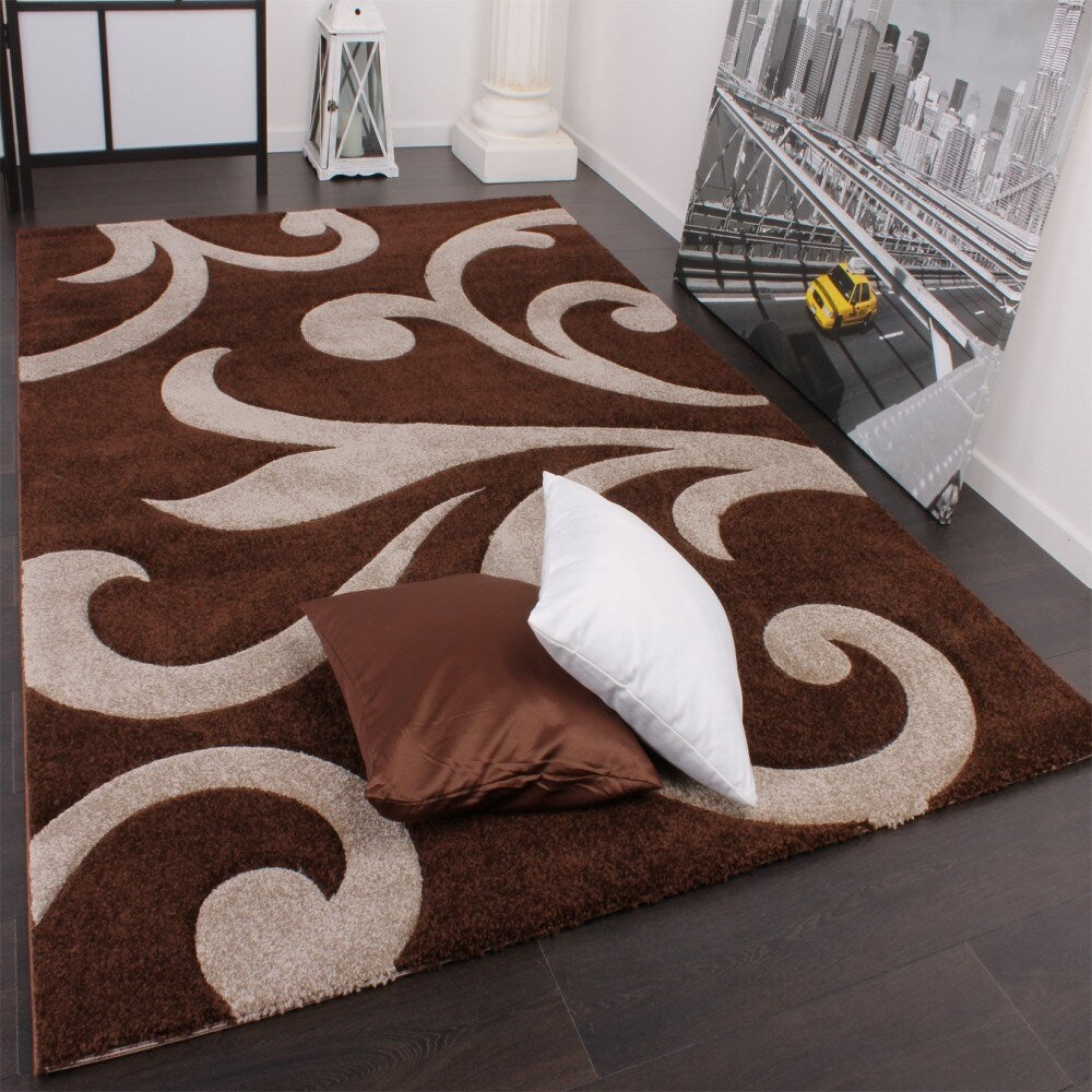 Tapis moderne à motif floral avec contour découpé