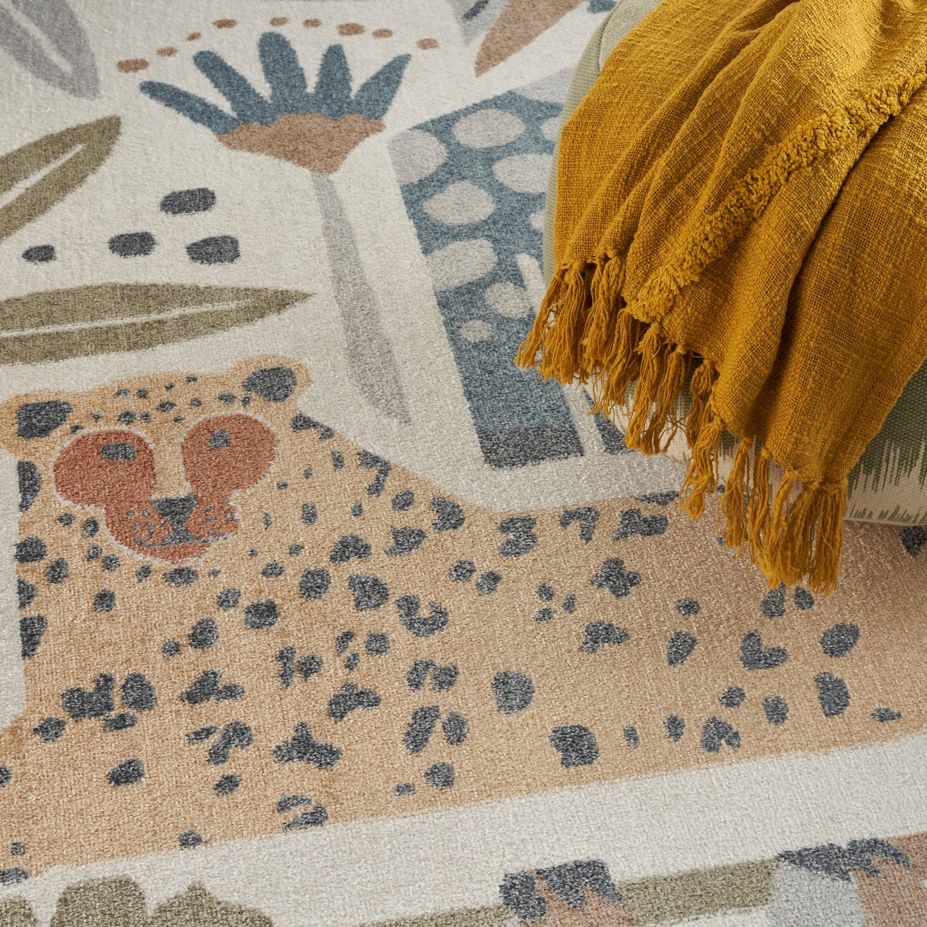 Tapis Nourison Astra lavable en machine à imprimé animal