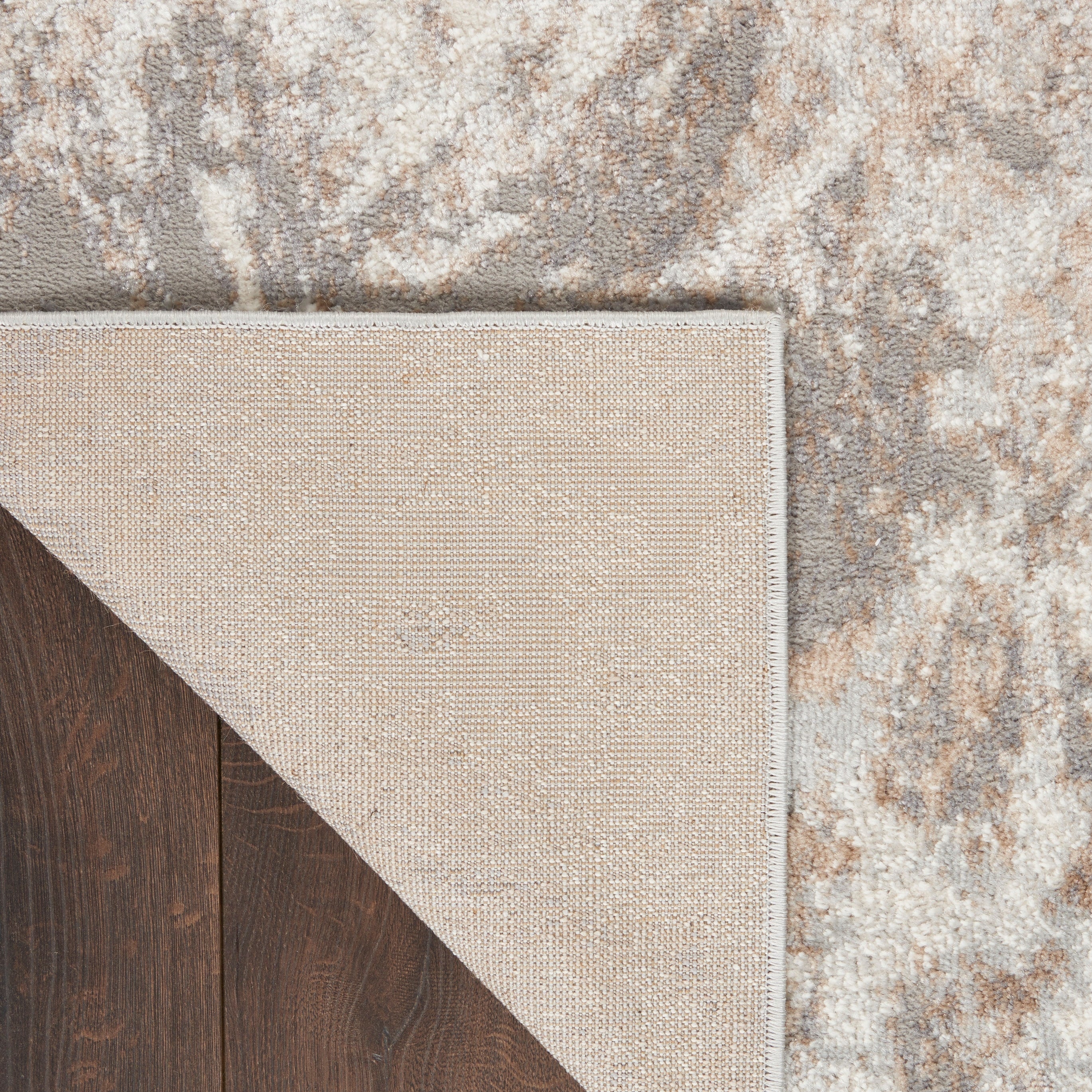 Tapis moderne abstrait gris ivoire Nourison Elation