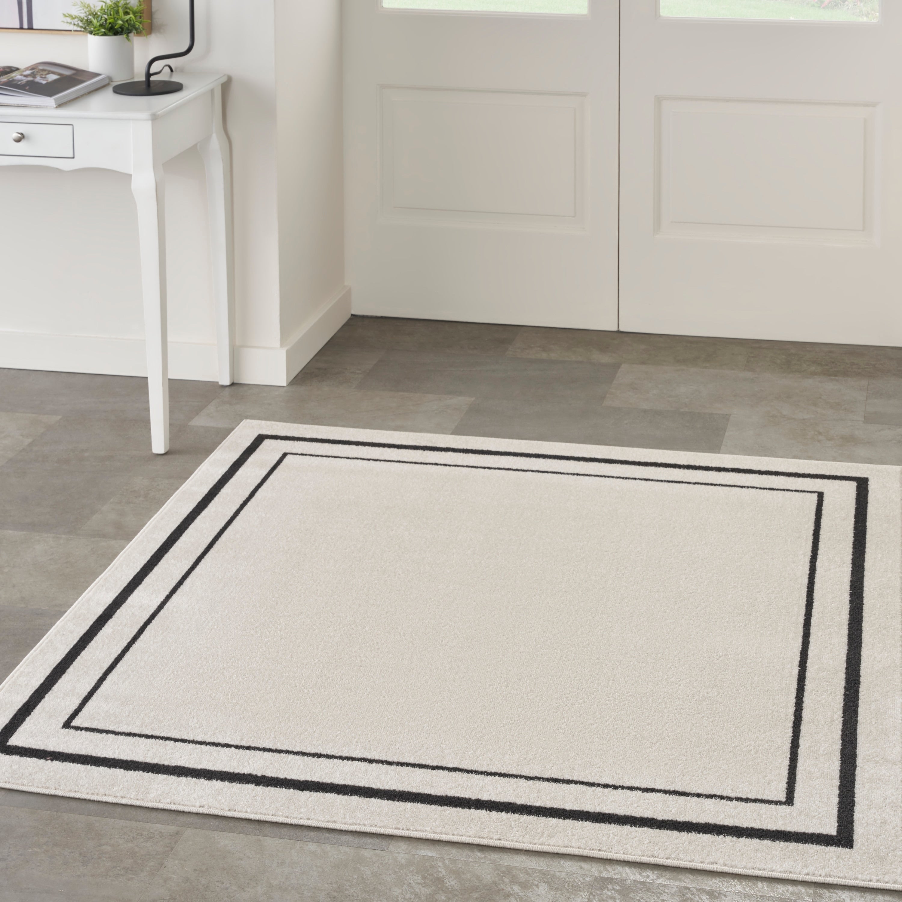 Tapis uni d'intérieur/extérieur Nourison Essentials