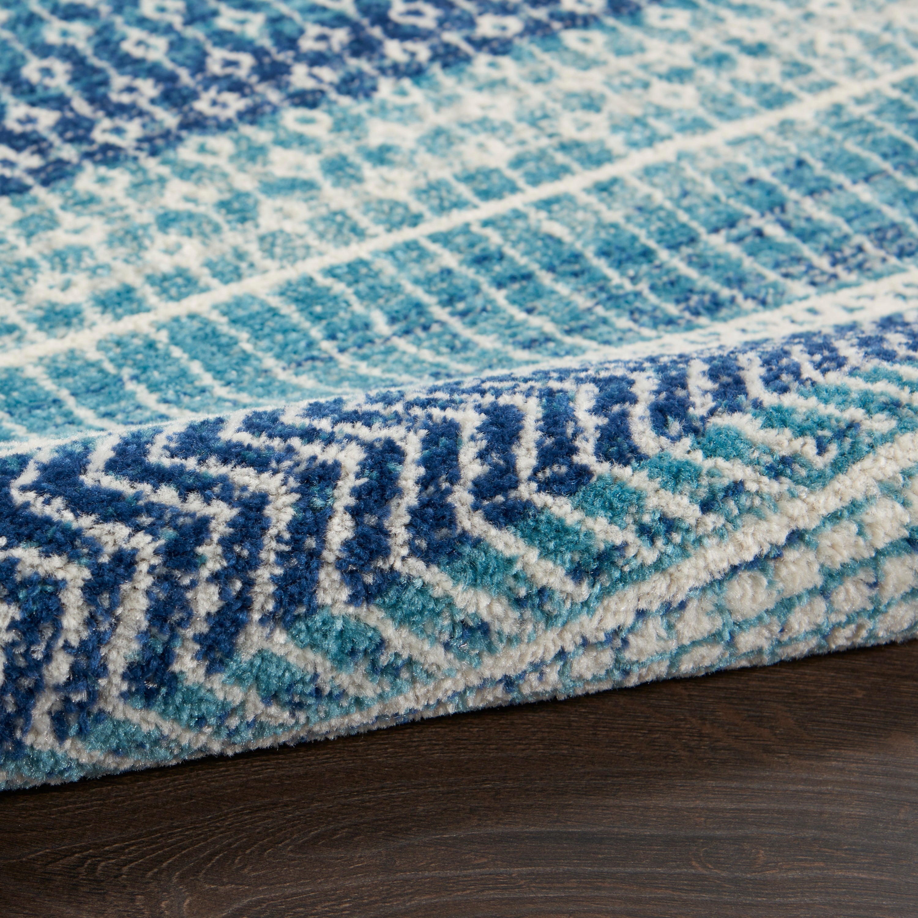 Tapis géométrique côtier bleu indigo Nourison Passion