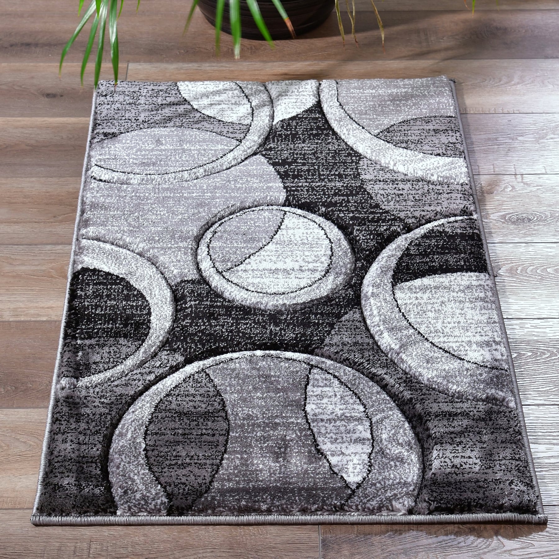 Tapis à motifs géométriques abstraits de la collection Orelsi