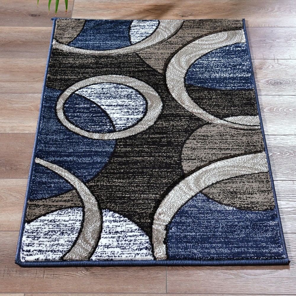 Tapis à motifs géométriques abstraits de la collection Orelsi
