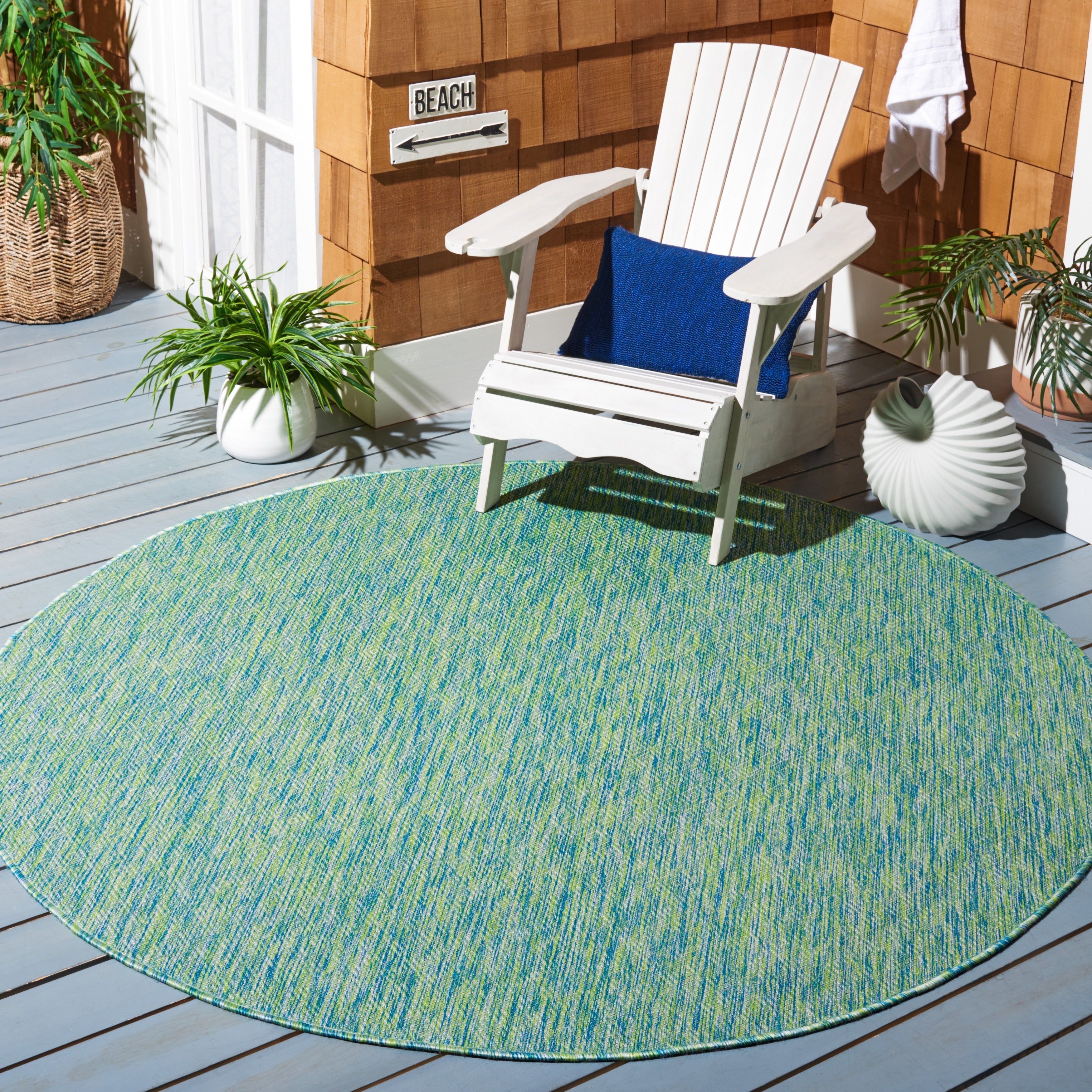 Tapis de jardin imperméable pour intérieur/extérieur SAFAVIEH Courtyard Begajeta.