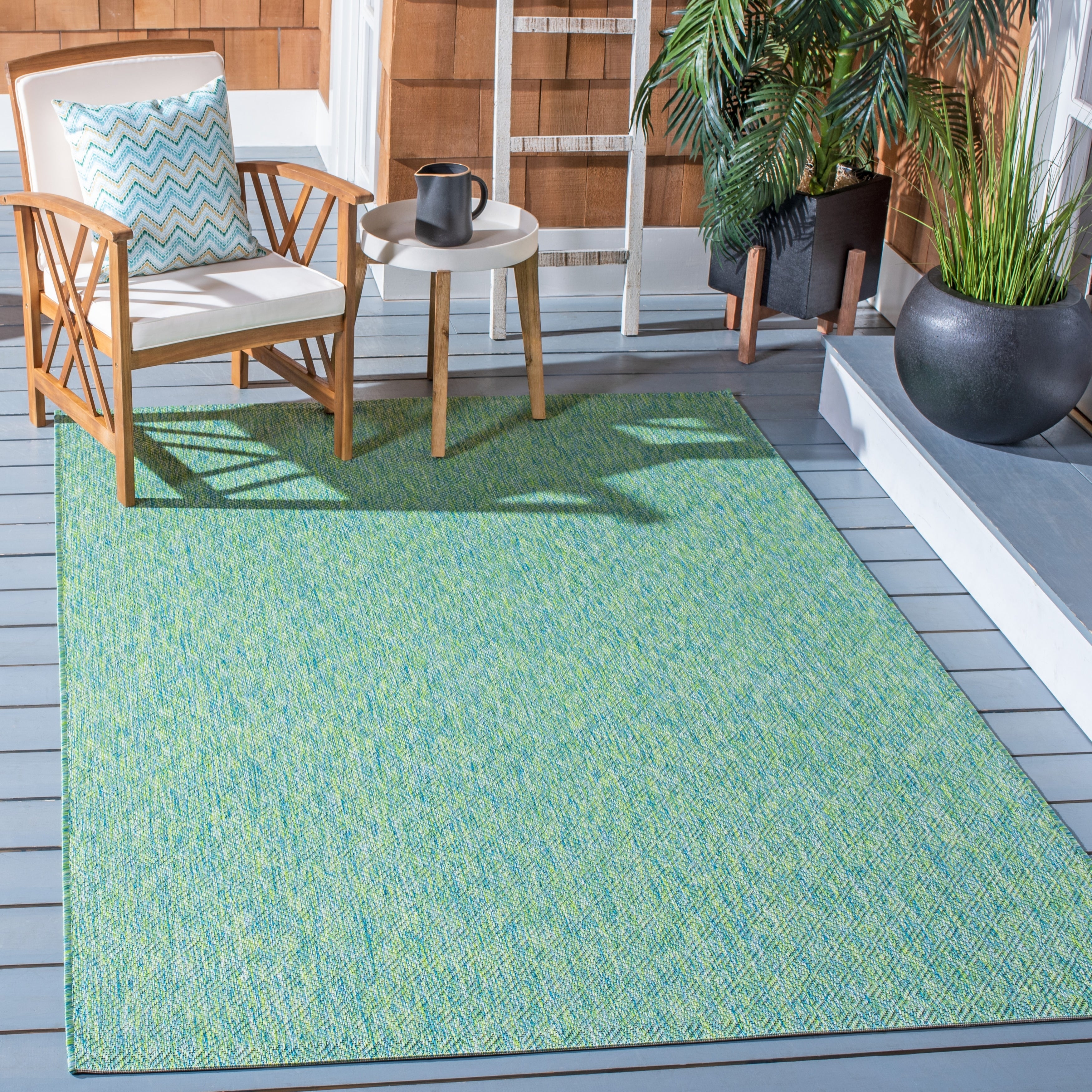 Tapis de jardin imperméable pour intérieur/extérieur SAFAVIEH Courtyard Begajeta.