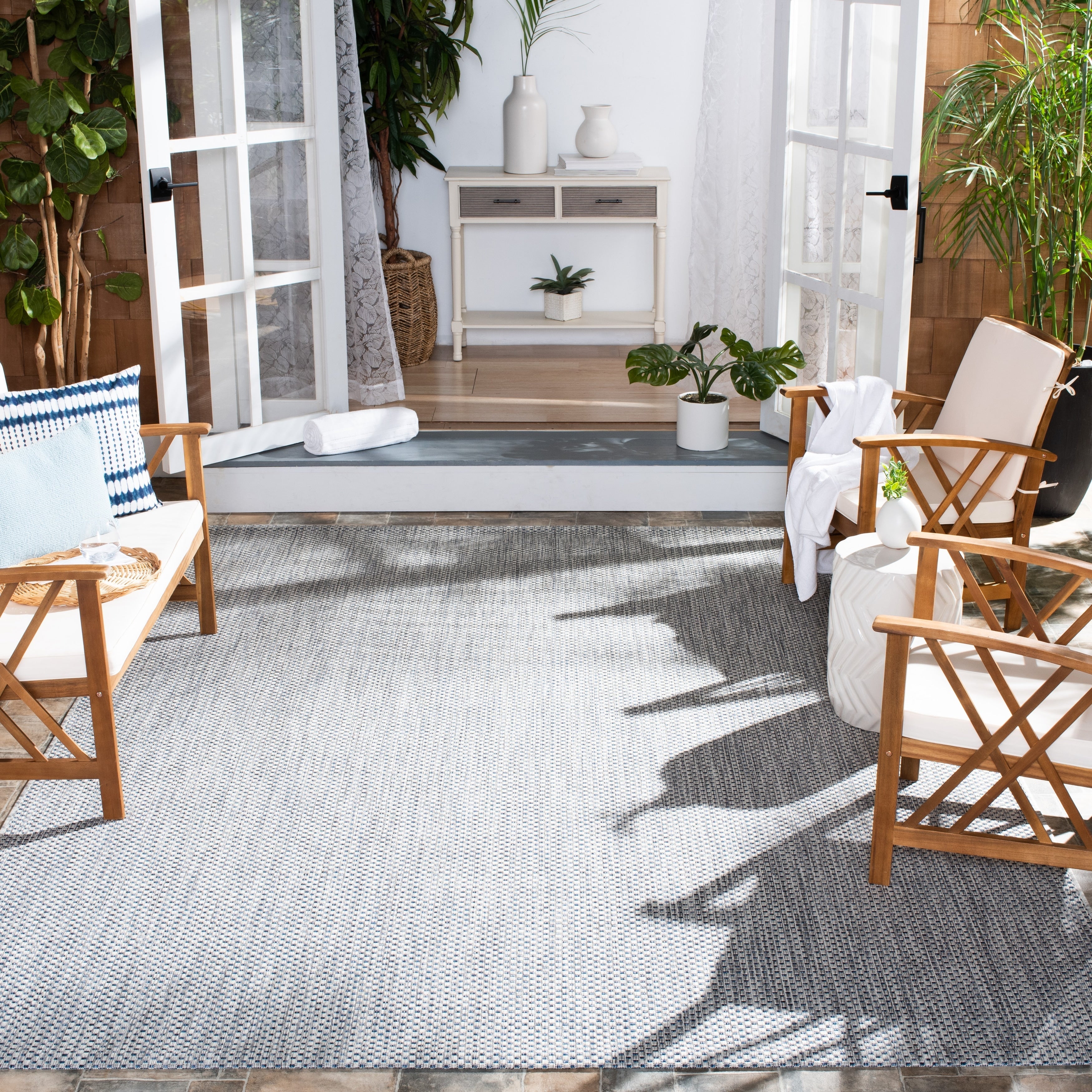 Tapis de jardin imperméable pour intérieur/extérieur SAFAVIEH Courtyard Begajeta.