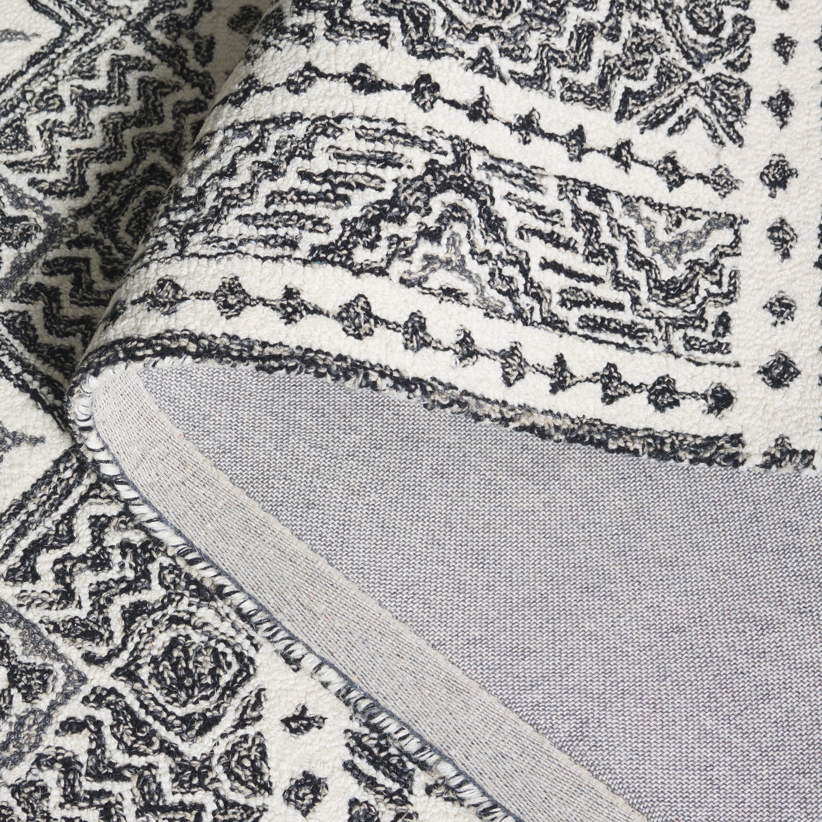 Tapis en laine Lutetia micro-bouclé fait main SAFAVIEH