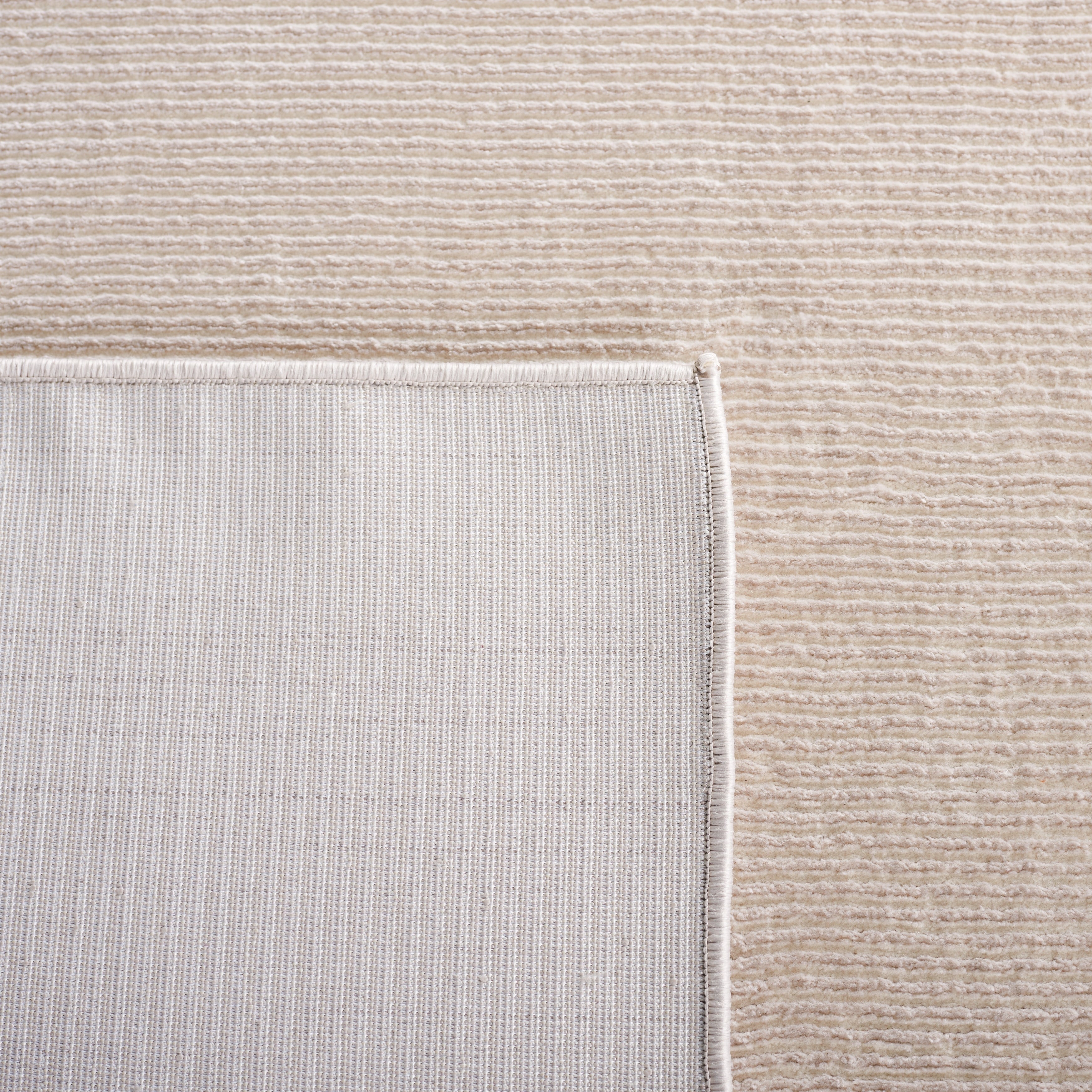 Tapis uni SAFAVIEH Revive Avie