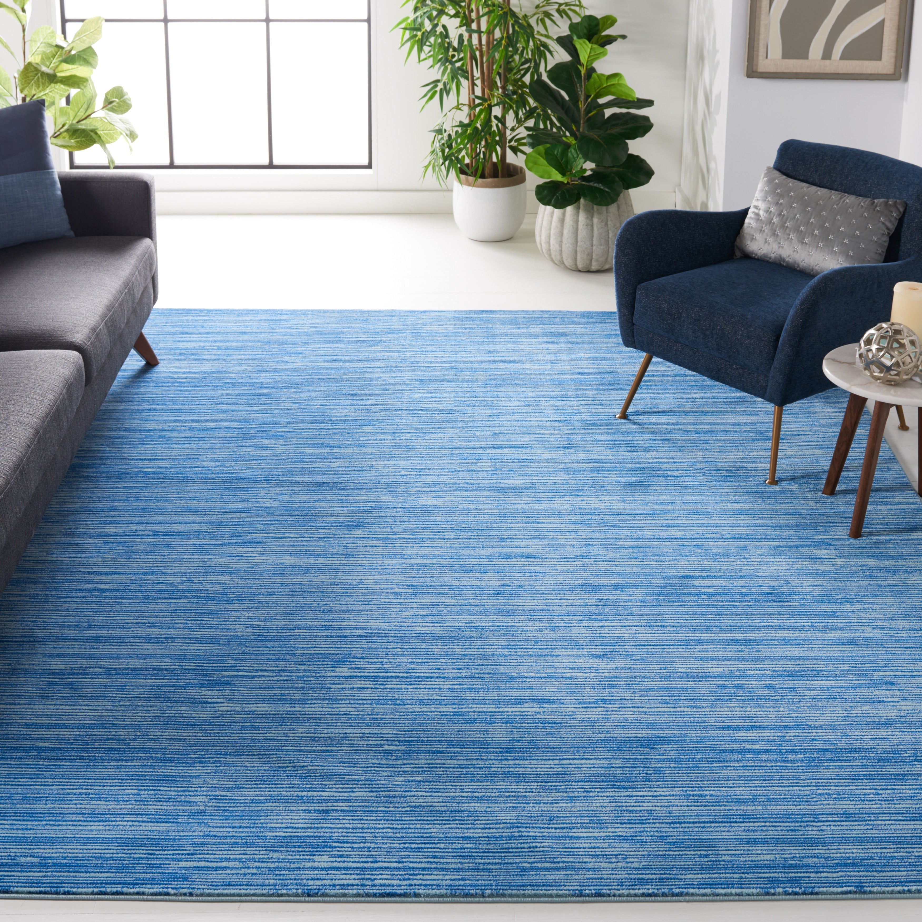 Tapis moderne SAFAVIEH Vision Sunanda aux tons ombrés.