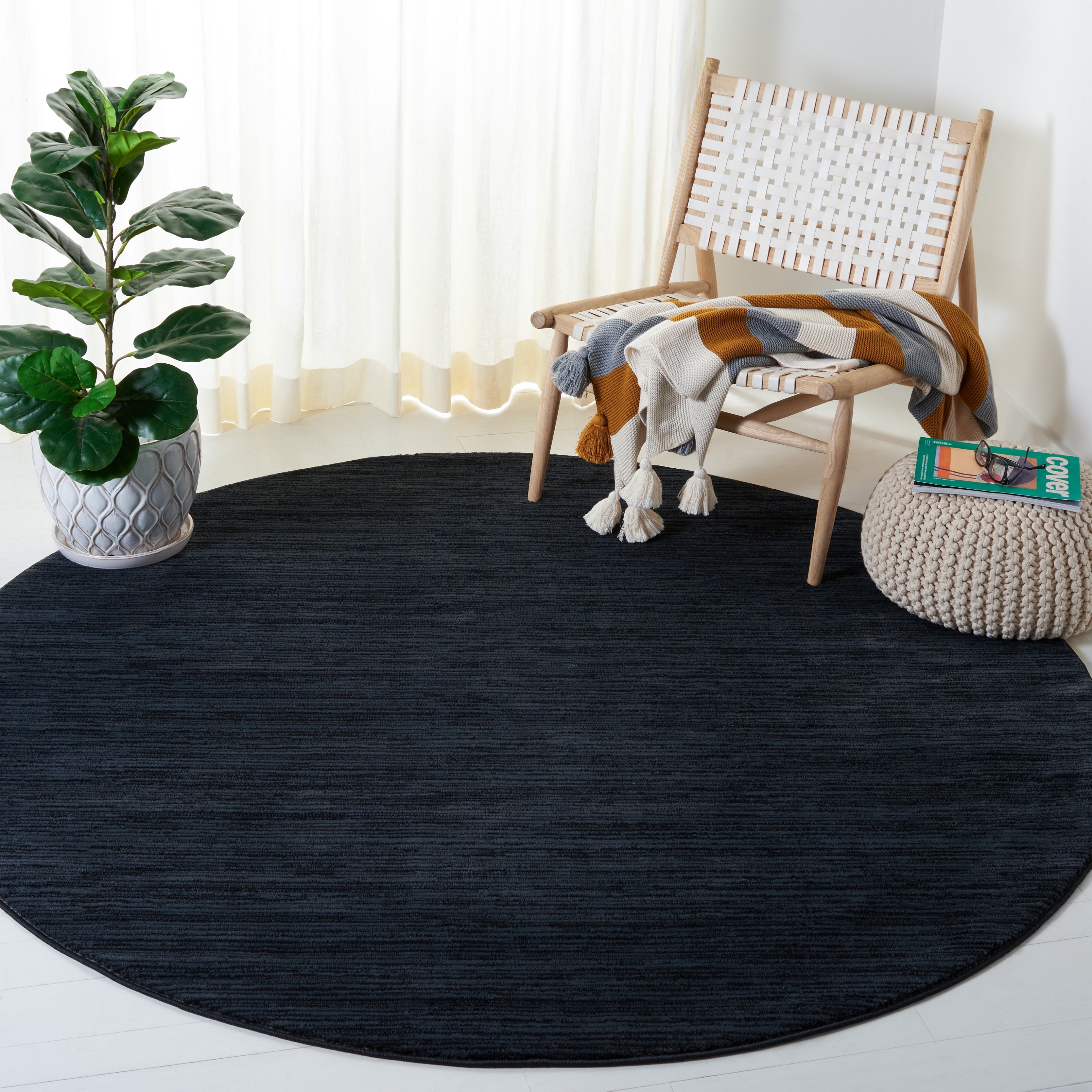 Tapis moderne SAFAVIEH Vision Sunanda aux tons ombrés.