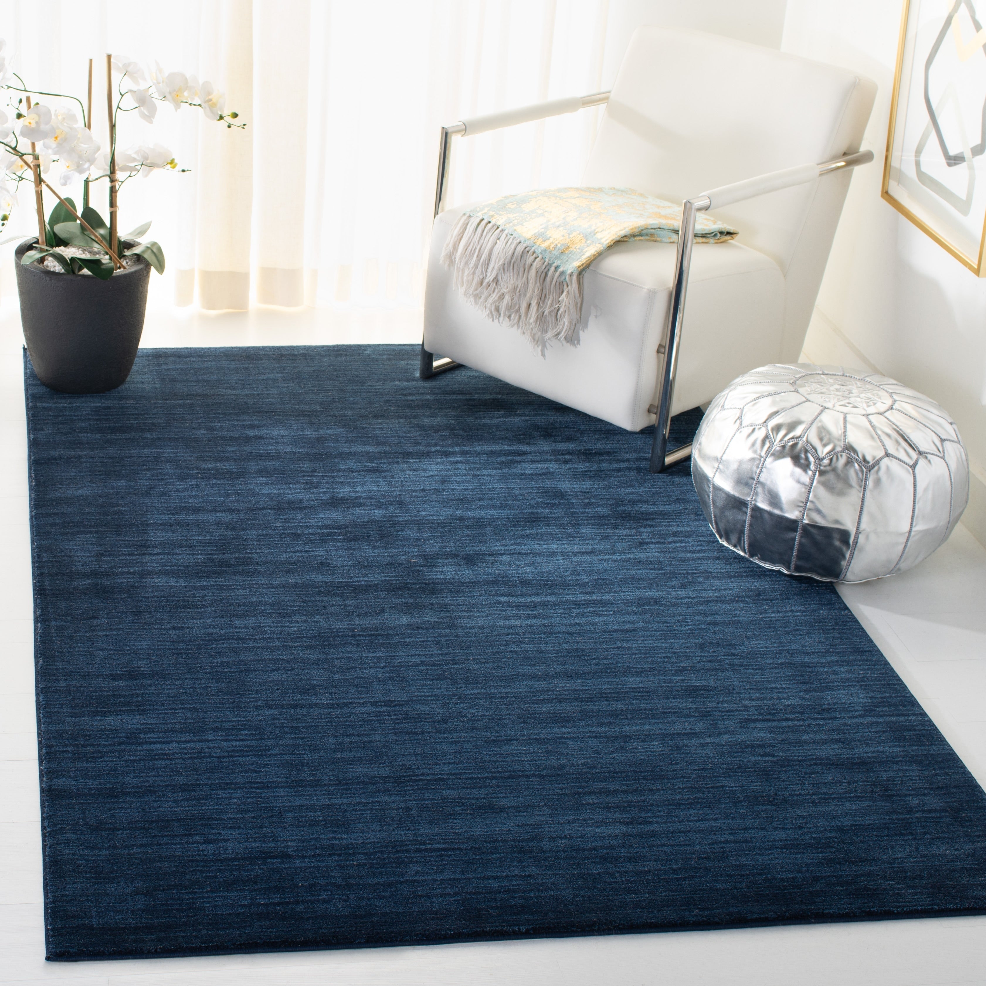 Tapis moderne SAFAVIEH Vision Sunanda aux tons ombrés.