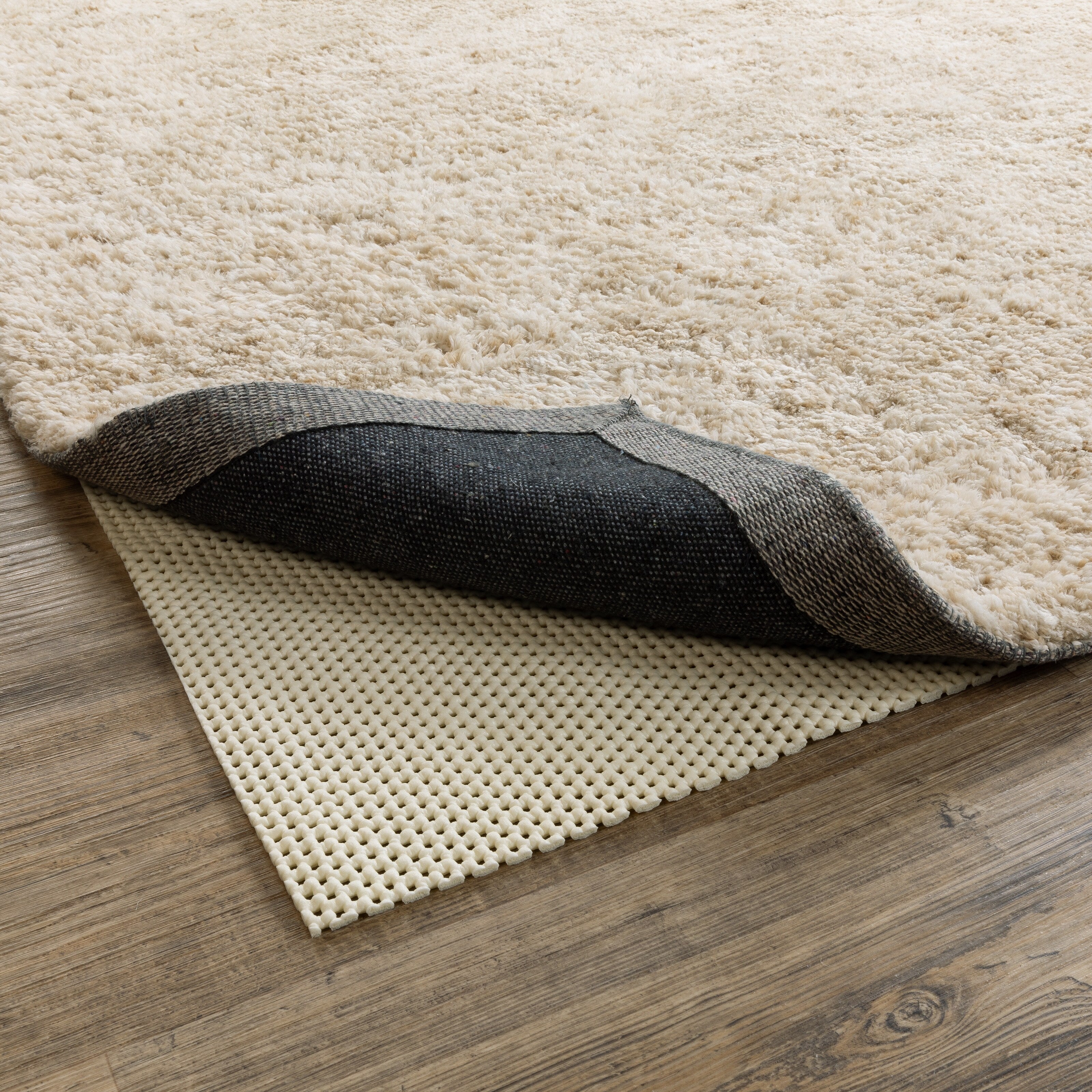 Sous-tapis Vista Home Ultra Hold en polyester tricoté avec revêtement en PVC blanc - Beige