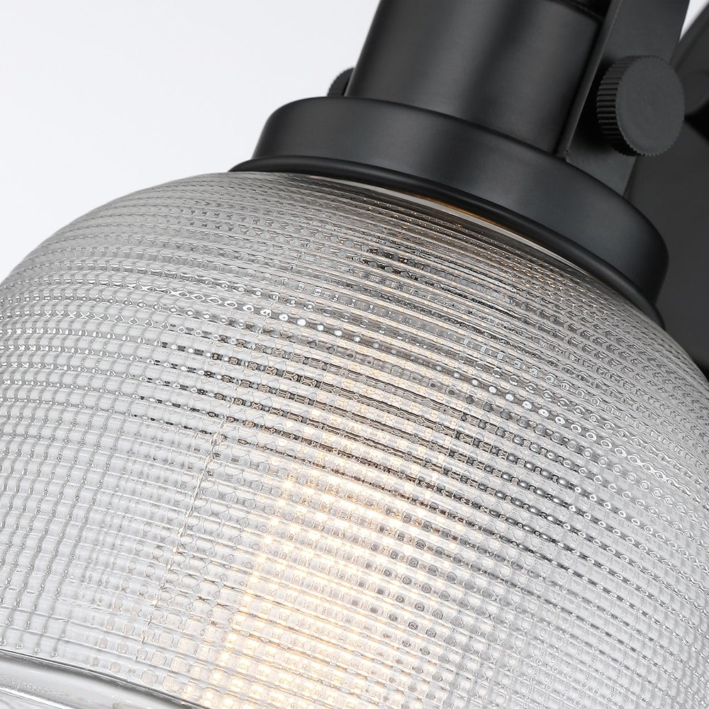 Applique murale de salle de bain noire avec abat-jour en verre prismatique transparent