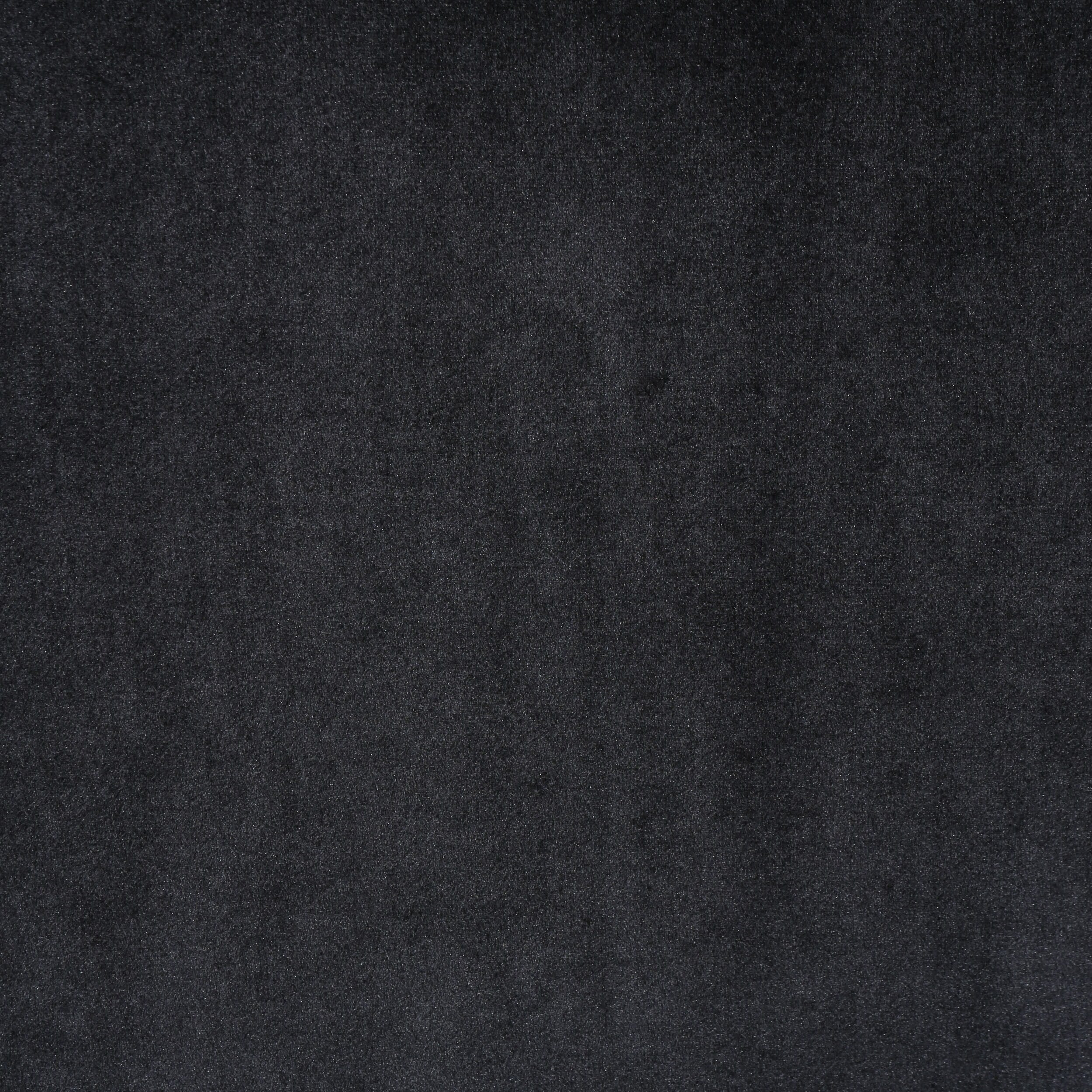 Canapé à oreilles hautes capitonné en velours noir