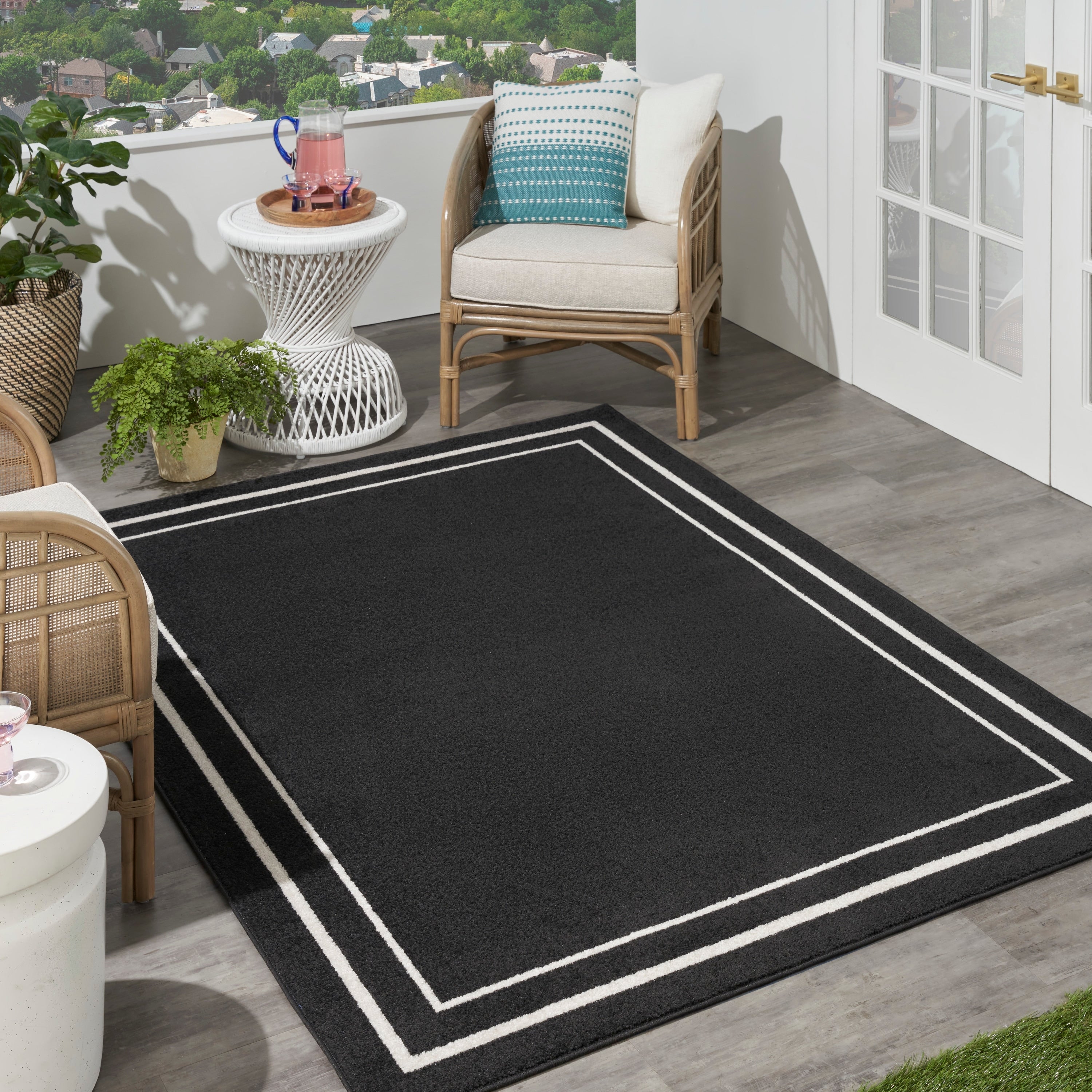 Tapis d'intérieur/extérieur uni Nourison Sandy