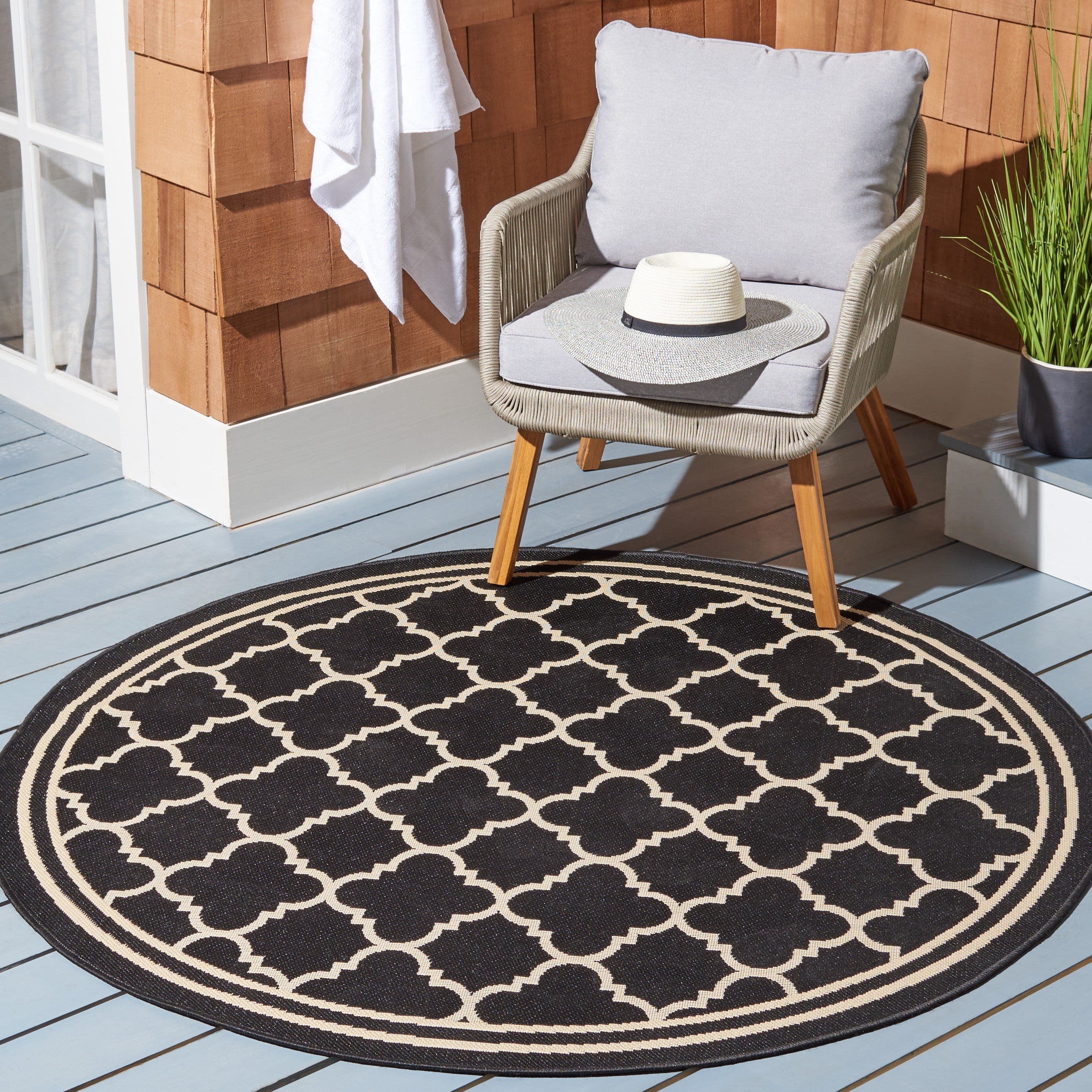 Tapis de jardin imperméable d'intérieur/extérieur SAFAVIEH Courtyard Kristelle