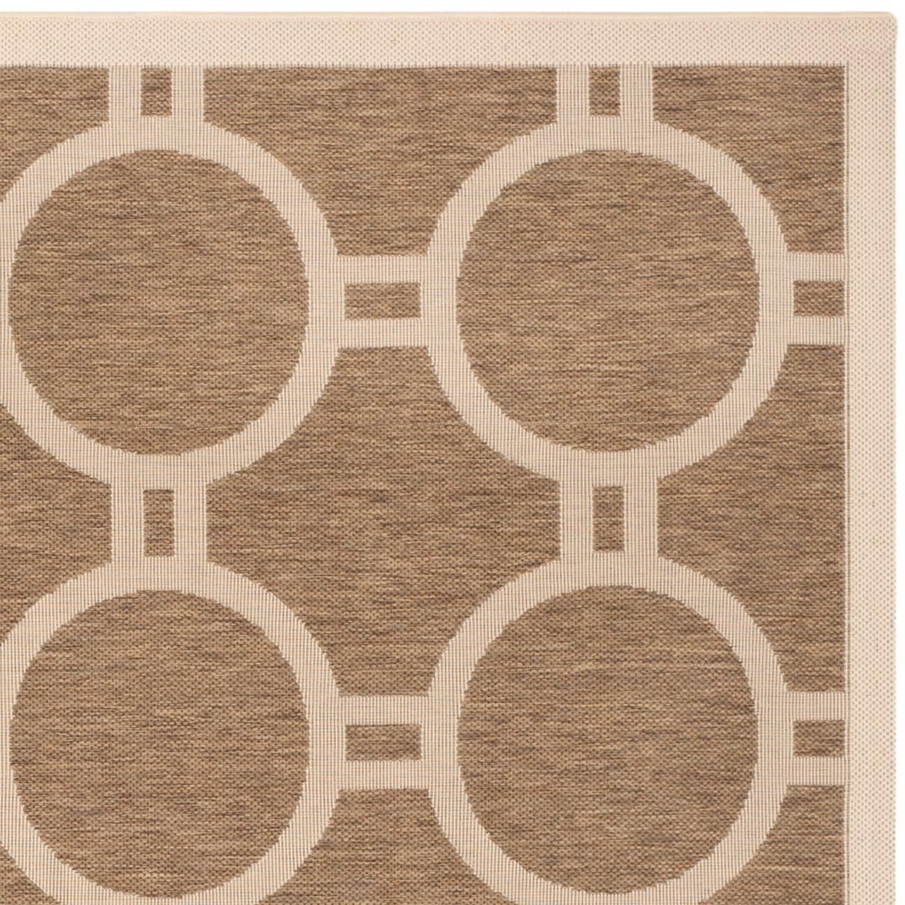 Tapis de jardin imperméable d'intérieur/extérieur SAFAVIEH Courtyard Nira