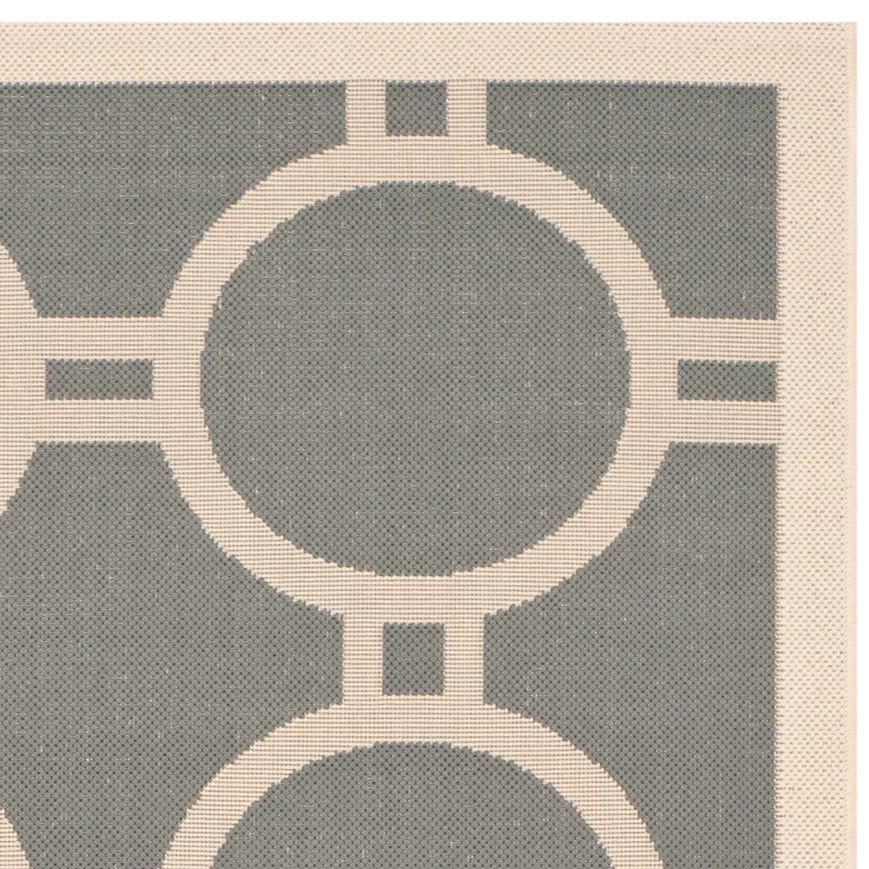 Tapis de jardin imperméable d'intérieur/extérieur SAFAVIEH Courtyard Nira