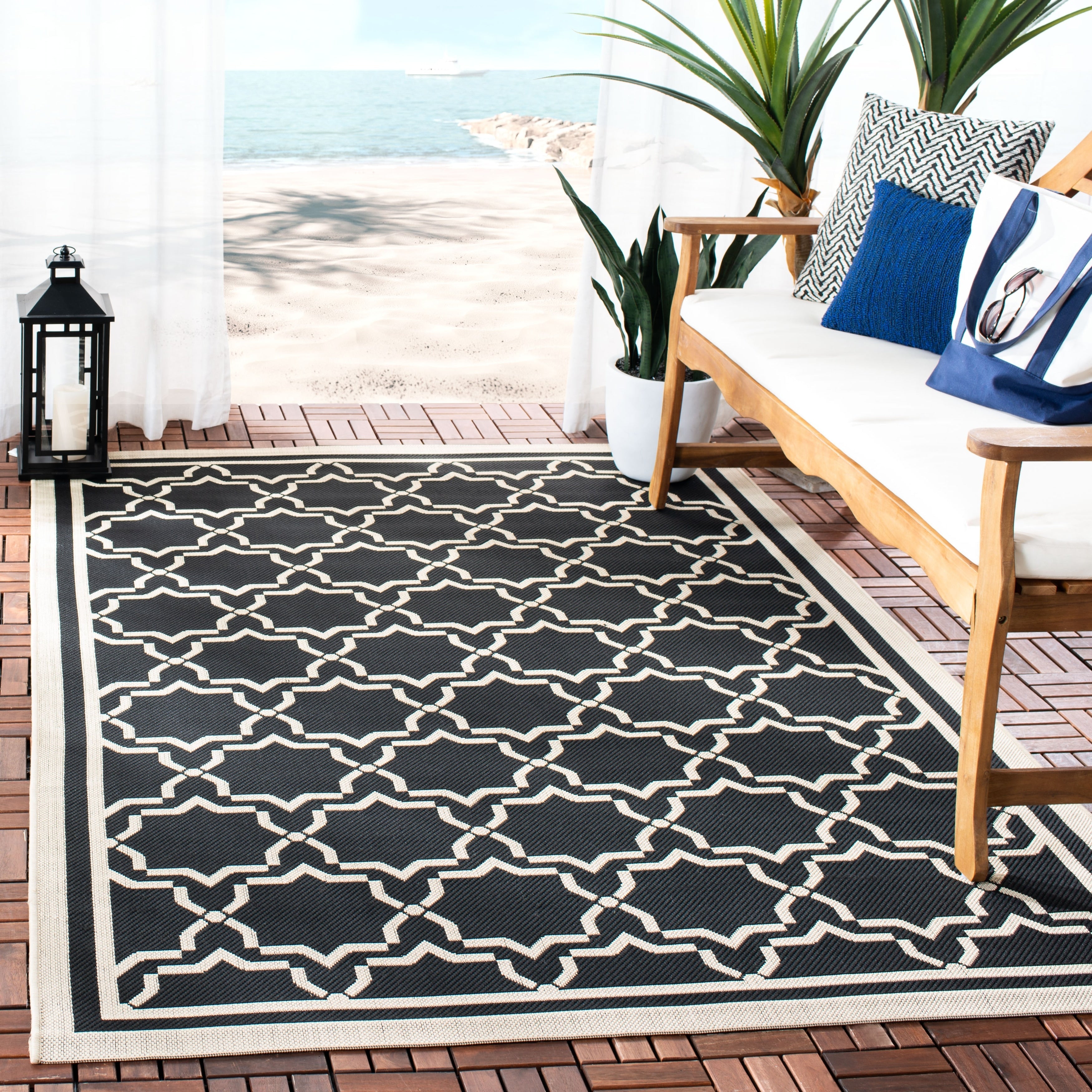 Tapis de jardin imperméable d'intérieur/extérieur SAFAVIEH Courtyard Thomasina