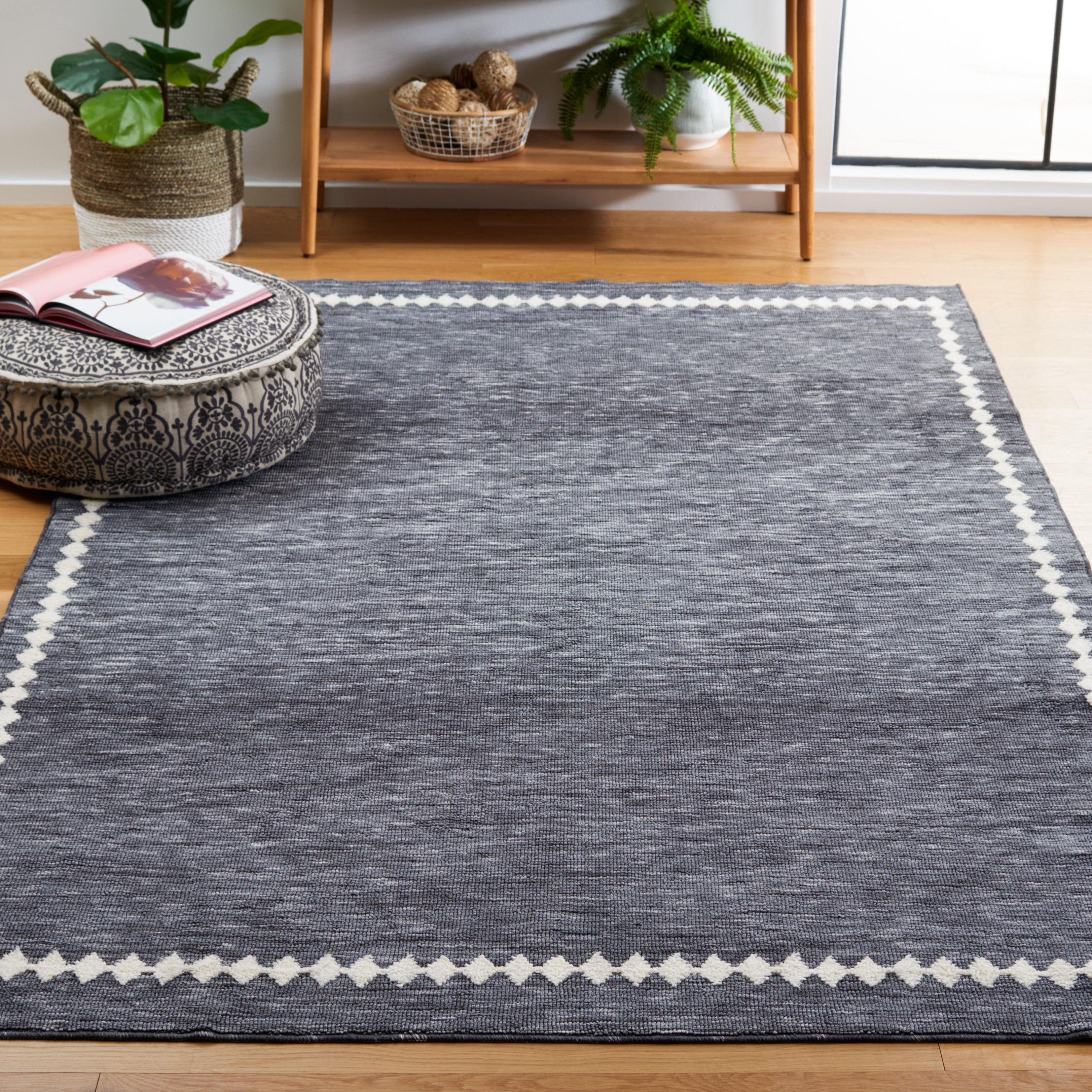 Tapis SAFAVIEH à bordure Lintrud, facile d'entretien et lavable en machine