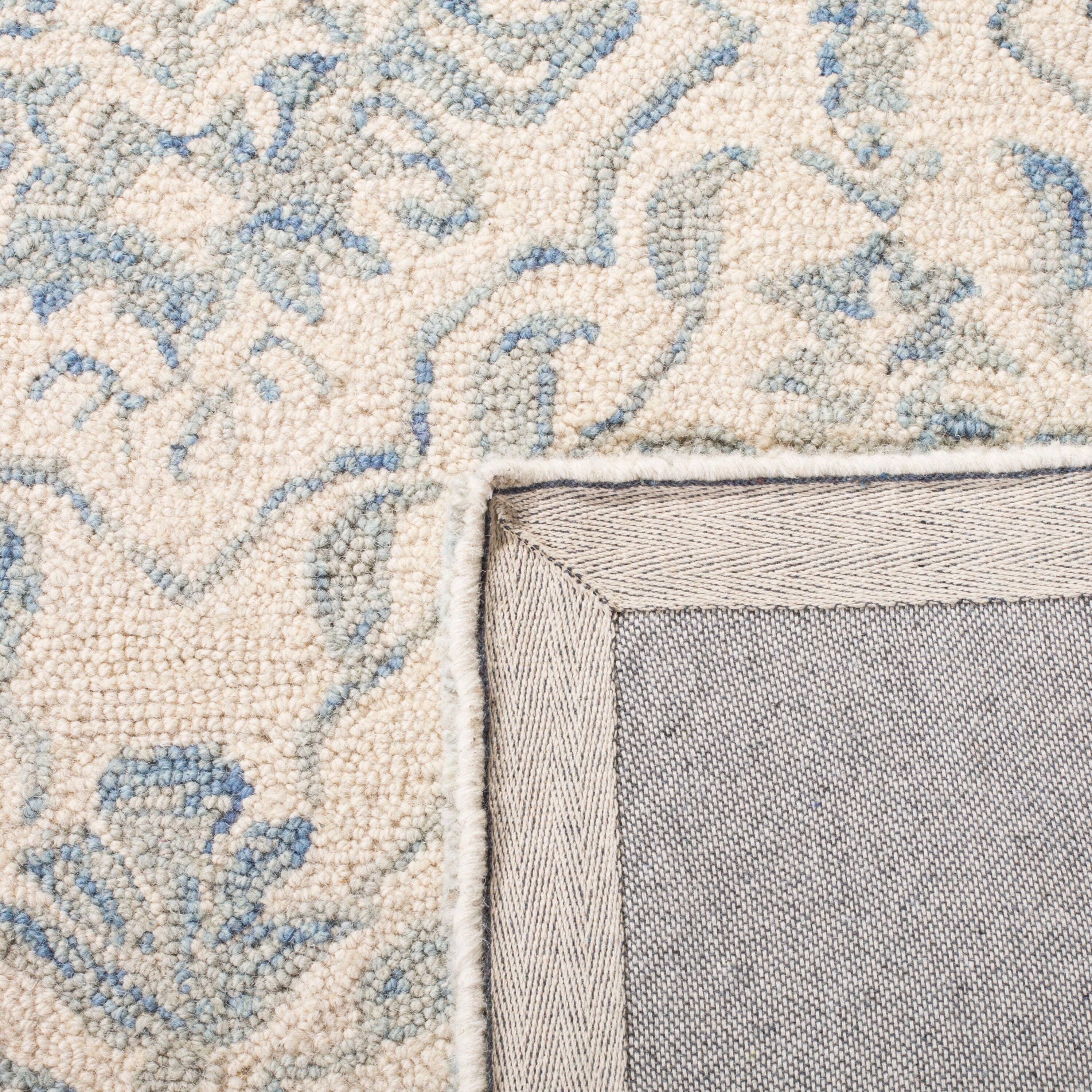 Tapis en laine florale Elvedina fait main SAFAVIEH, teint par immersion