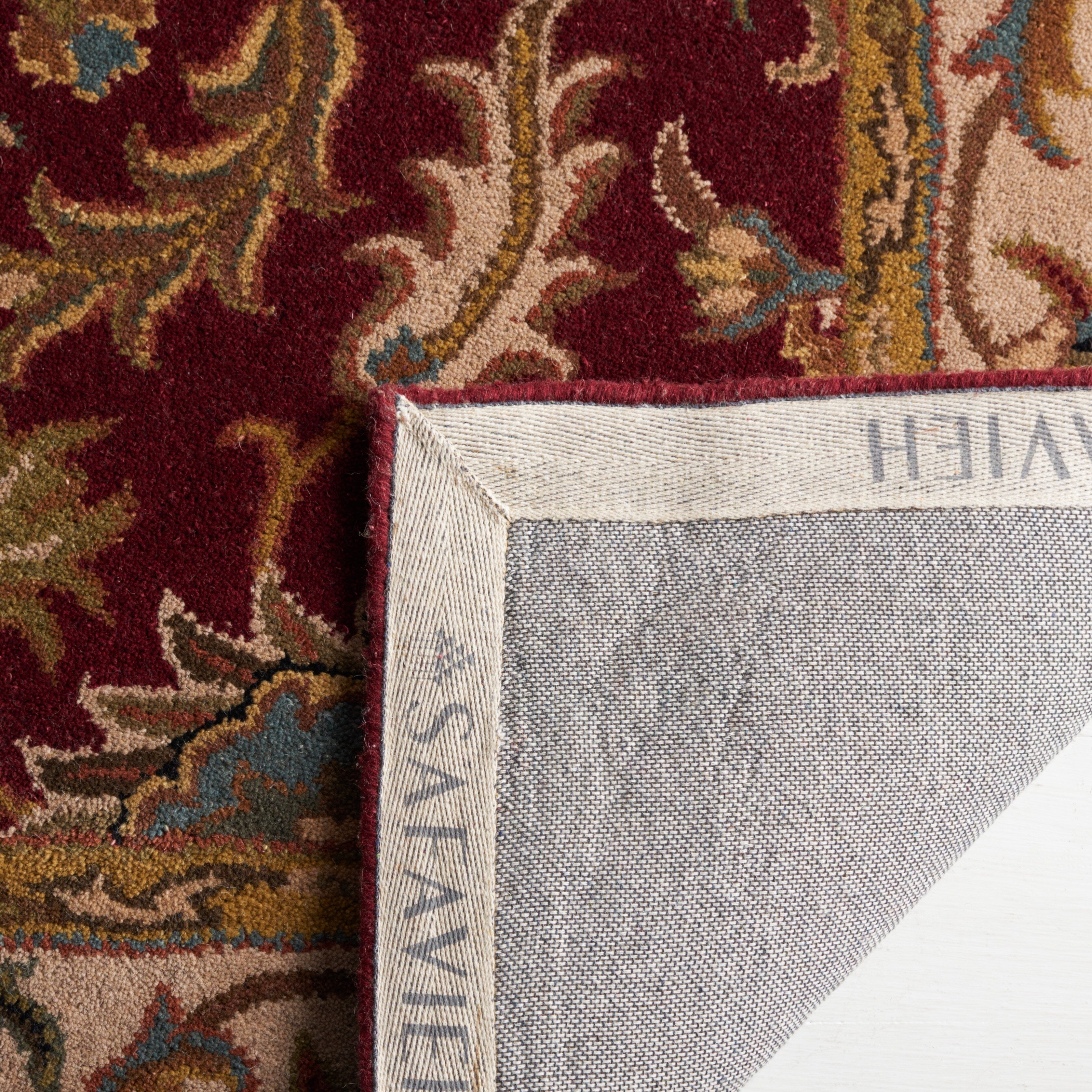 Tapis oriental traditionnel en laine SAFAVIEH Heritage Lion fait main