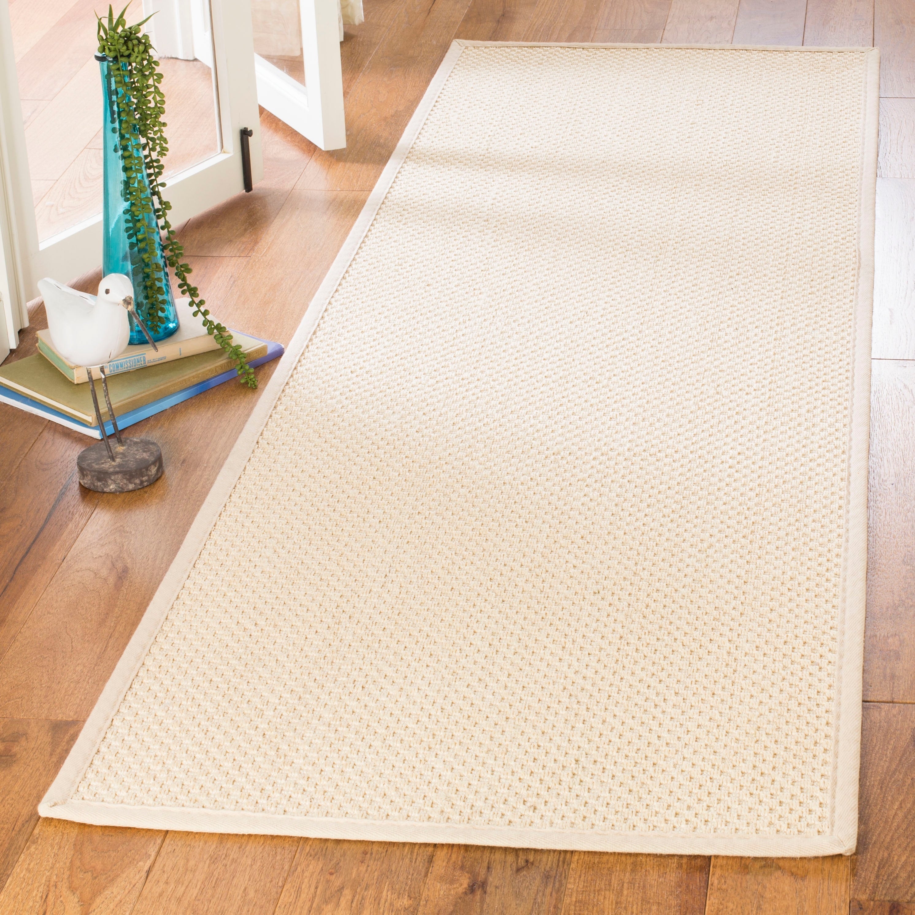 Tapis en jonc de mer Consuelo en fibres naturelles SAFAVIEH