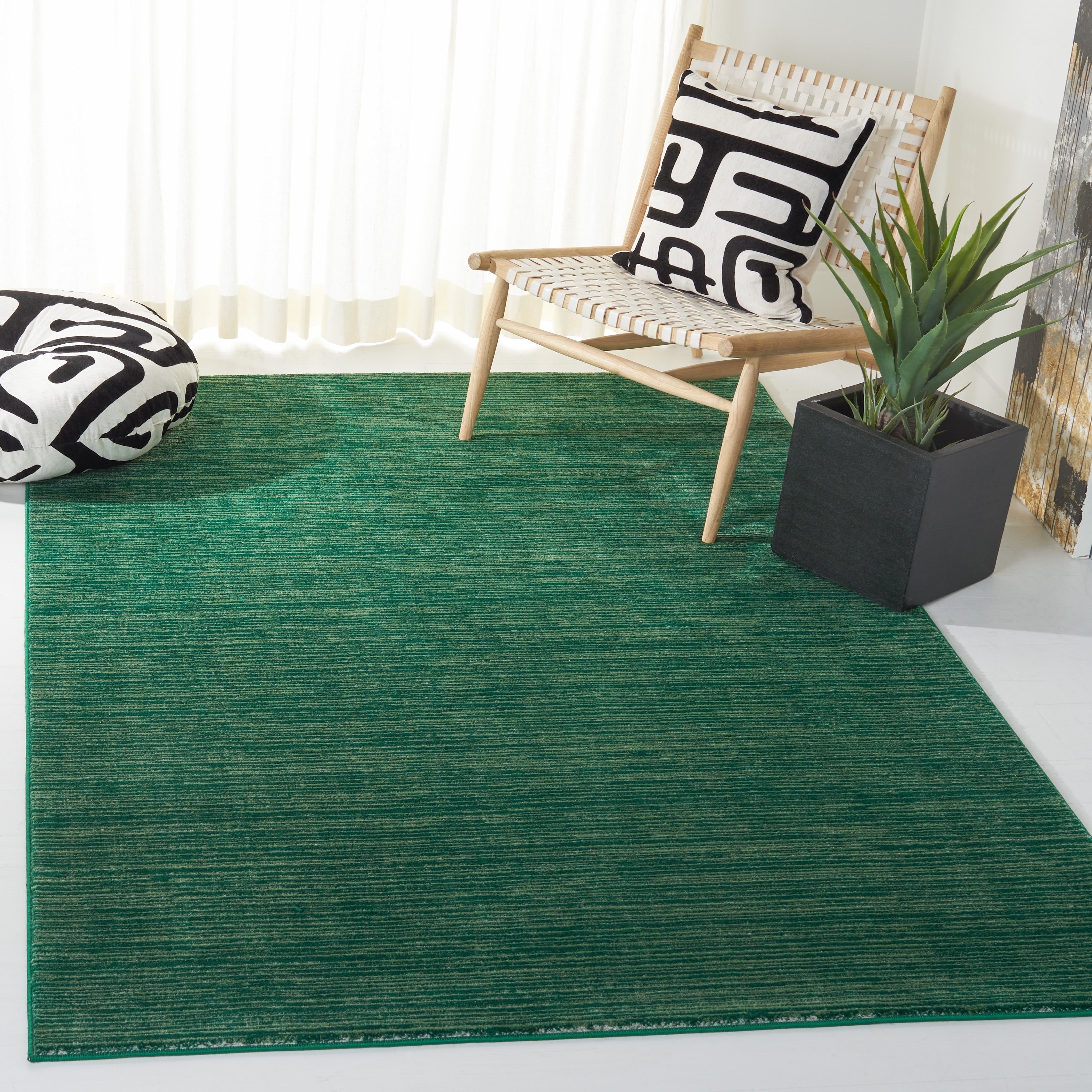 Tapis moderne SAFAVIEH Vision Sunanda aux tons ombrés.