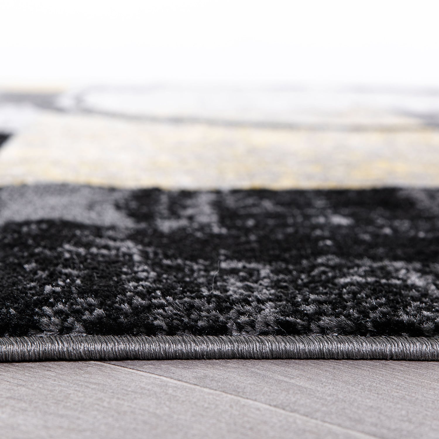 Tapis circulaire abstrait en polypropylène fabriqué à la machine, World Rug Gallery