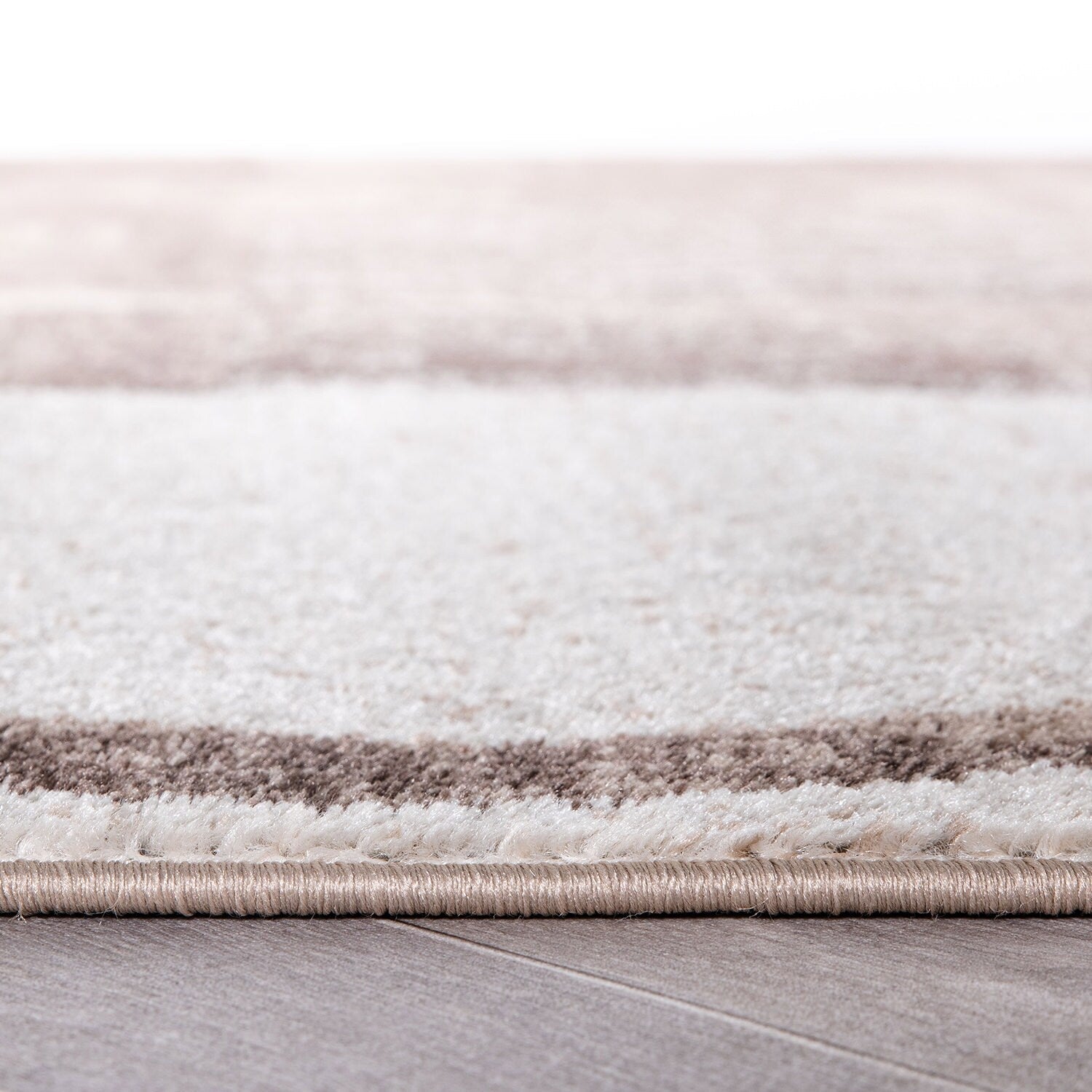 Tapis circulaire abstrait en polypropylène fabriqué à la machine, World Rug Gallery