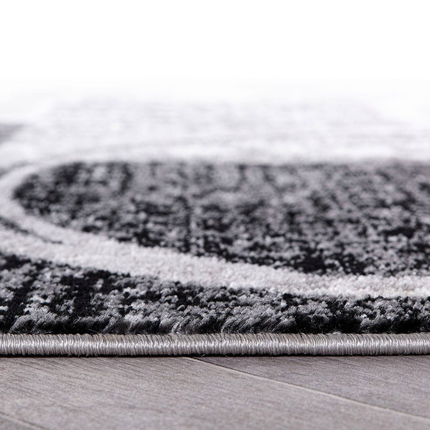 Tapis circulaire abstrait en polypropylène fabriqué à la machine, World Rug Gallery